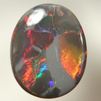 SOLID BLACK OPAL Unusual play of colour, bright fire